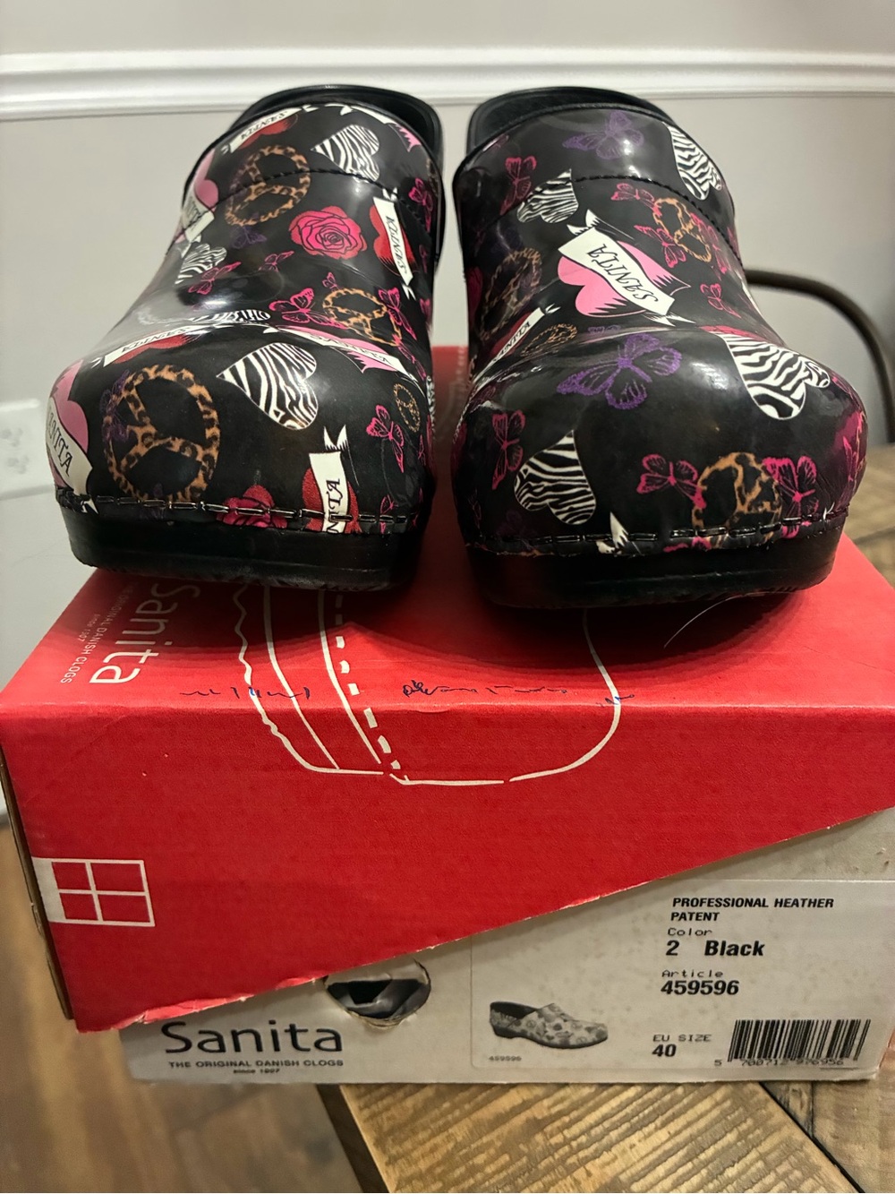 Sanita Black Clogs with Leopard and Zebra Accents